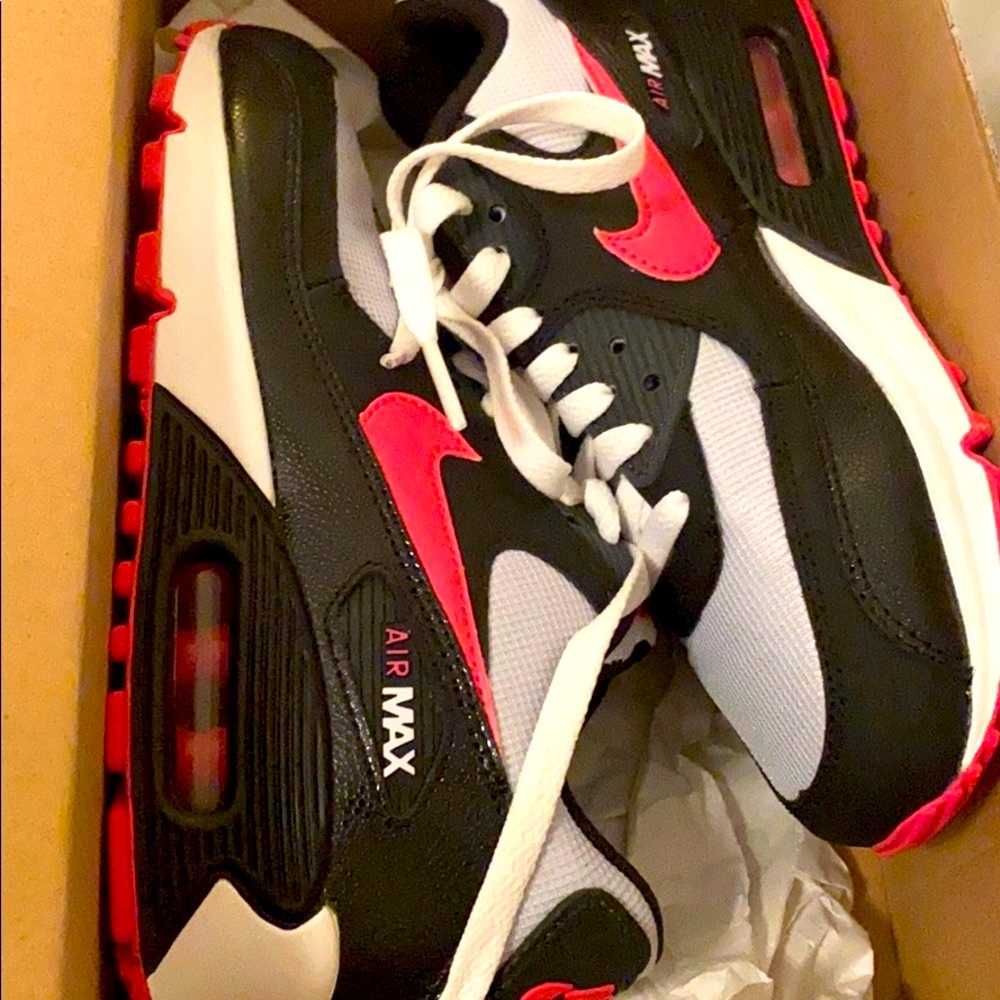 Pink, black, and white Nike Air Max 90s